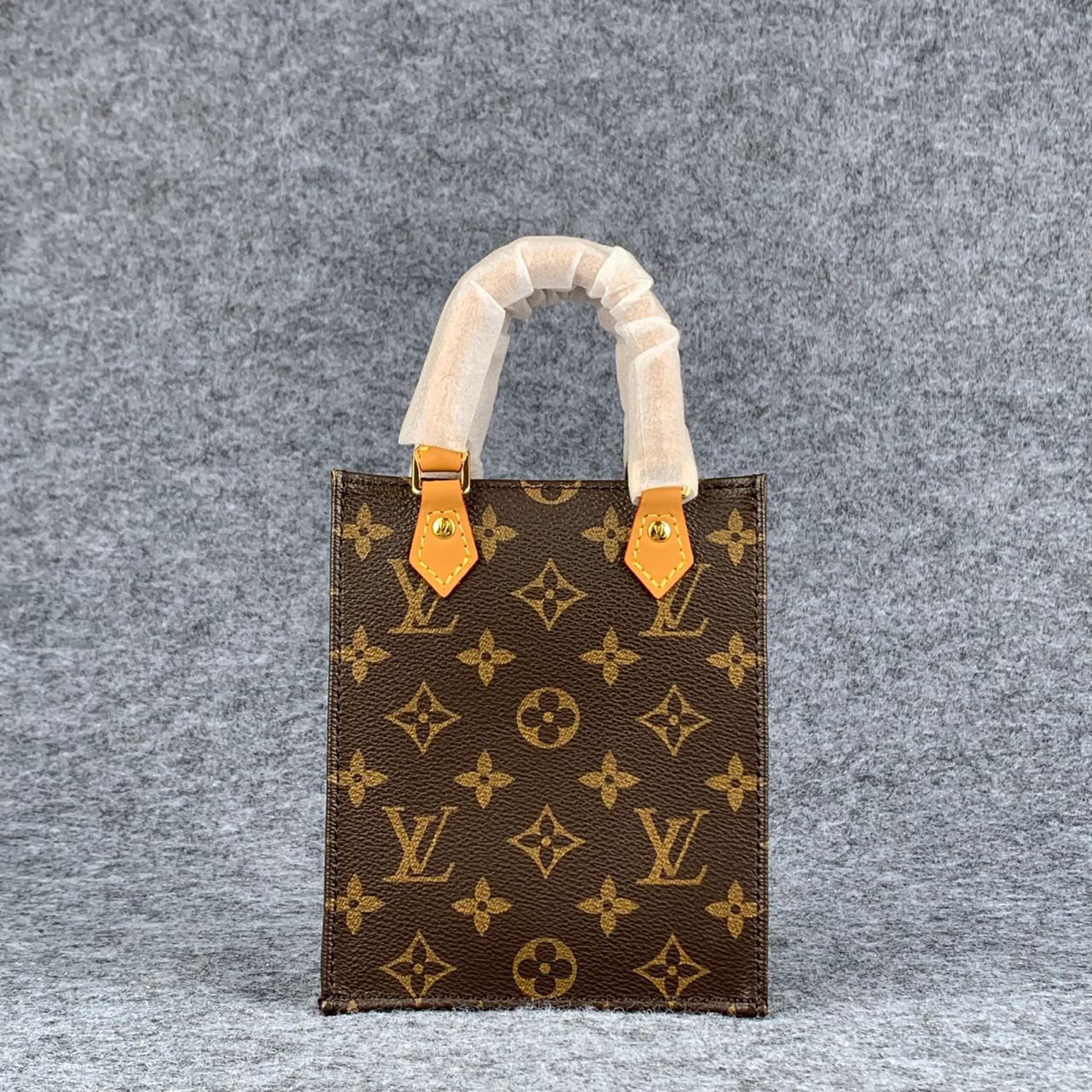 LV PETIT SAC PLAT  BROWN