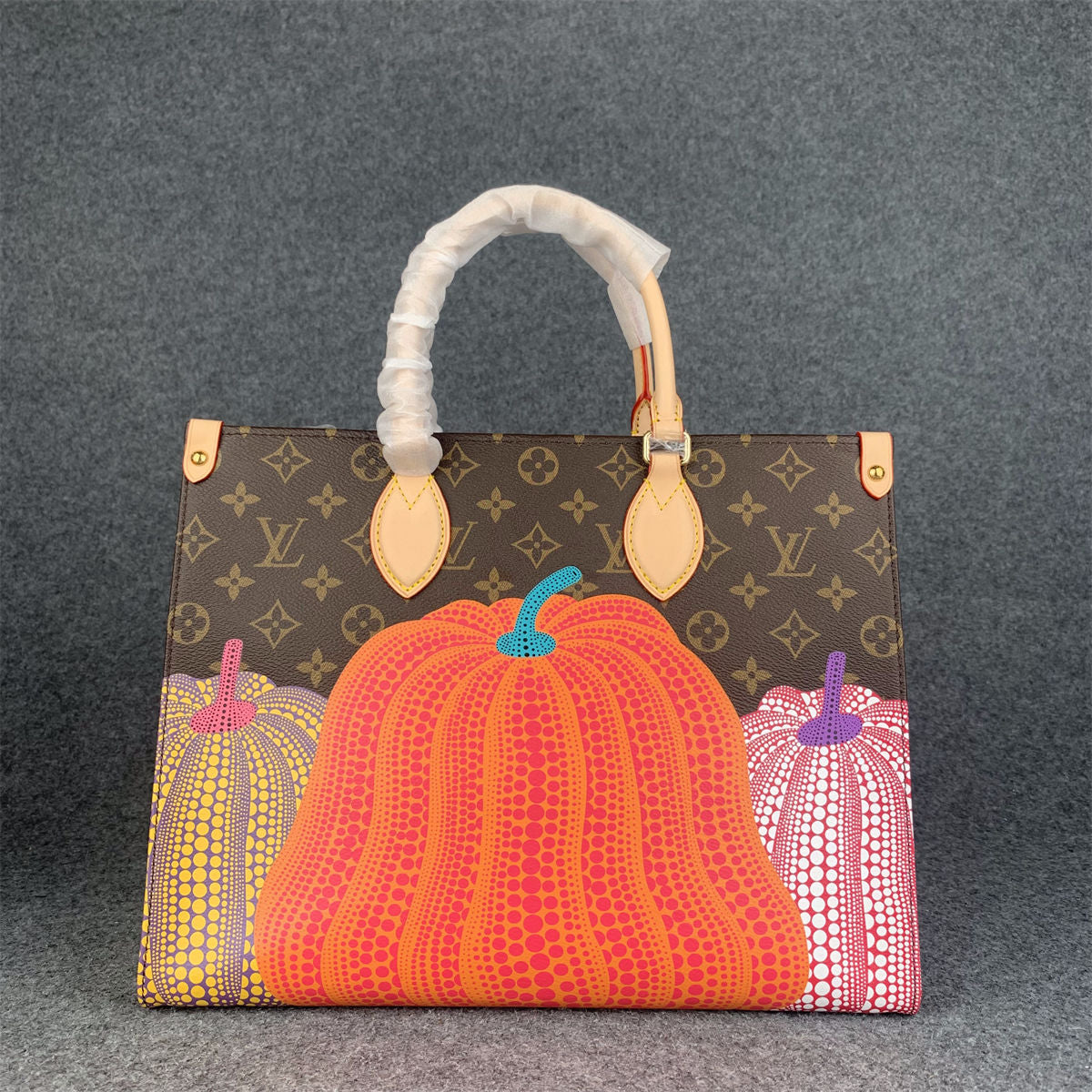 LV YK Onthego PM Pumpkin Print