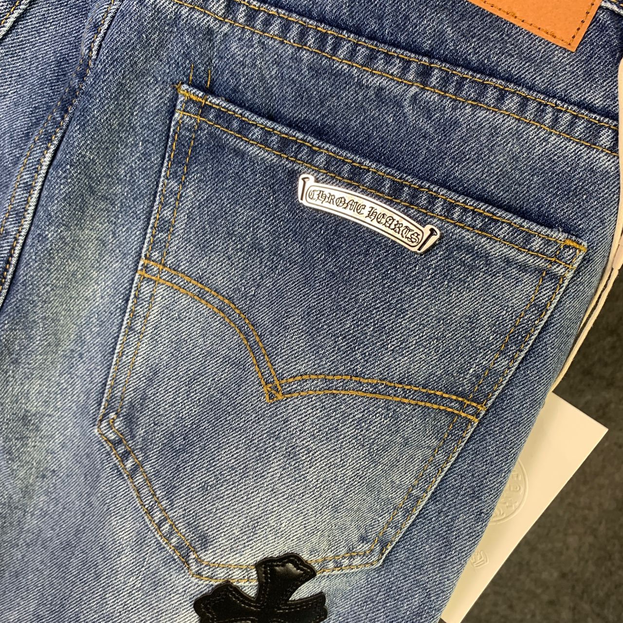 CHROME HEARTS Blue Jeans With Black Leather Crosses